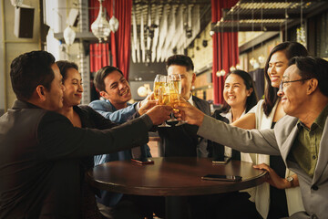 businesspeople toasting and clinking wine or champagne together