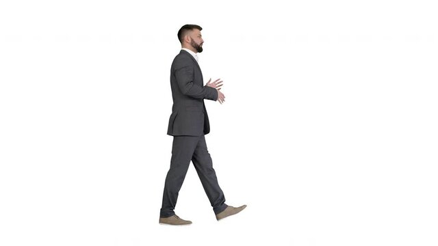 Bearded businessman walking and explaining something on white background.