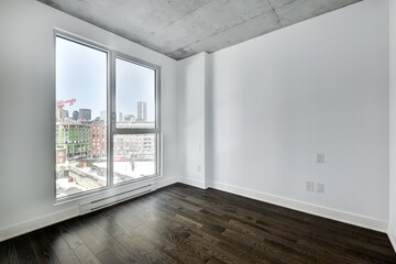 Real estate photography - Beautiful empty brand new apartment in an apartment building with bathroom, new kitchen, new floors, all white painted