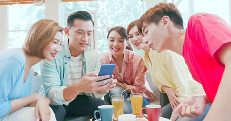 friends watch smart phone