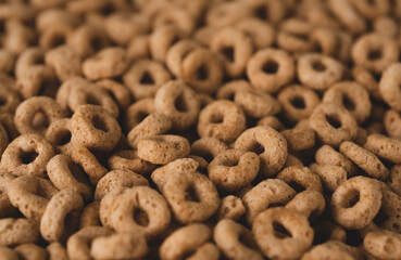 Macro photo of Healty whole grain ring  cereal, macro close up. selective focus