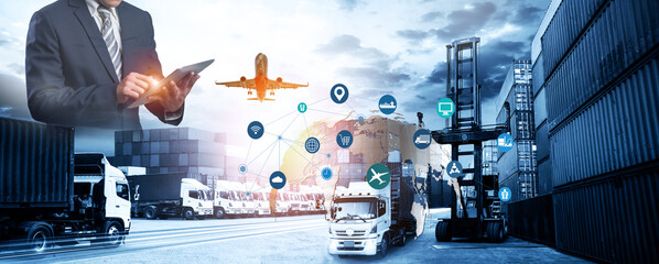 Multiple exposures of Businessman touching tablet for analyze stock at logistics port and world map with logistic network distribution on background, transportation trading business concept,