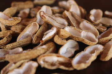 The peanut, also known as the groundnut, goober (US), or monkey nut (UK), and taxonomically classified as Arachis hypogaea, is a legume crop grown mainly for its edible seeds.