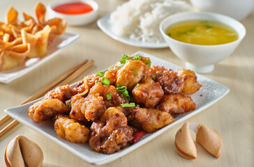 chinese general tsos chicken meal with crab rangoon and egg drop soup