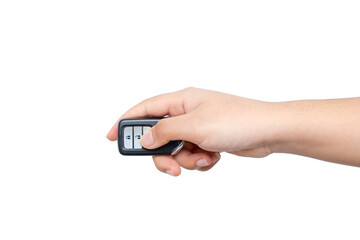 Young woman opening her luxurious car door the modern control remote keys isolated on white background. Hand is locking the automobile with the security system.