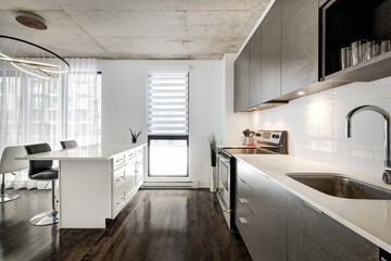 Real estate photography - Beautiful modern apartment in an apartment building with bathroom, kitchen, swimming pool