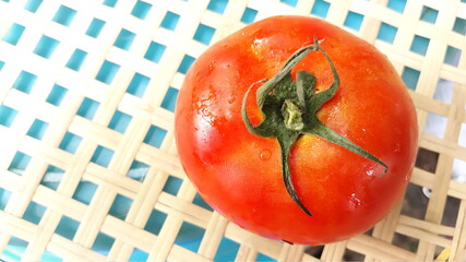 tomato on a wooden background