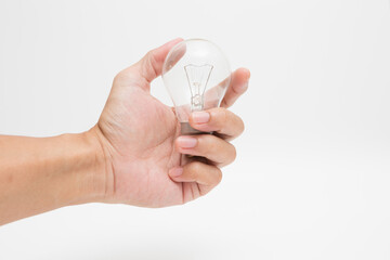 Hand holding a tungsten light bulb  on white background