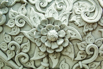  Old white wall design bas-relief with stucco wild flower