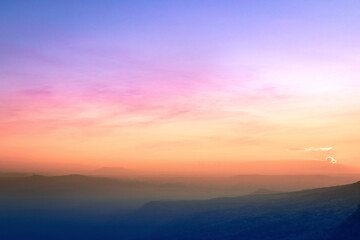 Mountain and sky sunset background. Mak Duk cliff, Phu Kradueng National Park, Loei, Thailand