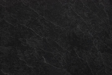 Dark grey black slate background or texture.