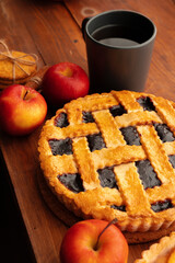 Naklejka na ściany i meble Close up of homemade traditional sweet autumn raspberry tart pie on wooden table