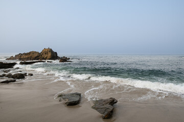 Small Beach on a Rocky Coastline 