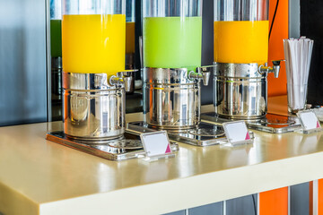 Row of fresh juice buffet self service at the hotel.