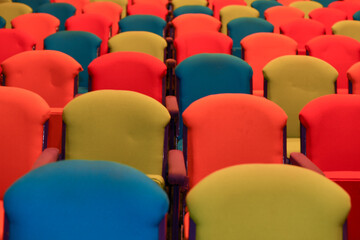 Naklejka premium Bright colored chairs inside empty auditorium