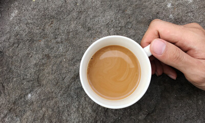 coffee milk in the hands of young men