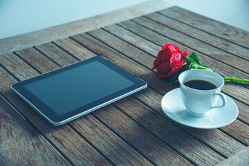 Office laptop business financial document chart and graph on wooden table with coffee cup. Flat lay notebook computer laptop on office desk. No people business graph chart mockup on business workspace