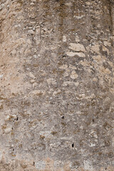Grungy gray concrete wall, vertical background photo