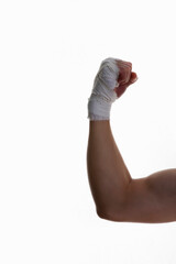 bandaged fist on white background