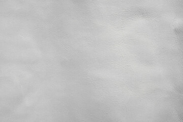 Naklejka premium Natural white leather texture, useful as a background. Color luxury fabric with pattern rough cloth surface. Weathered antique grain animal.