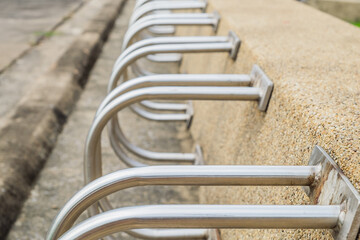 Bicycle racks in bicycle parking facility background.