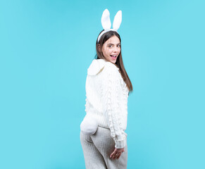 Easter bunny girl. Happy Easter. Funny girl with bunny ears on Easter card, isolated.