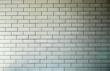 Abstract weathered texture stained old stucco light clean color and aged paint concrete white brick wall background in the room. Grunge decorative pattern on the street.