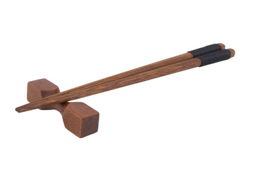 Wooden chopsticks with holder isolated on white background, Japanese style