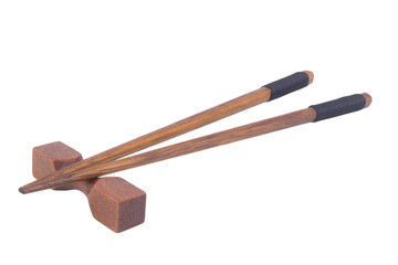 Wooden chopsticks with holder isolated on white background, Japanese style