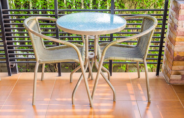 The cozy interior design of the cafe with table and chair with sunlight in the morning. The modern casual coffee shop or restaurant background.