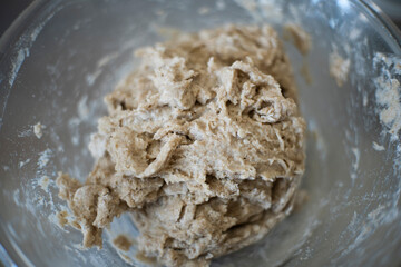 mixing water and whole wheat flour together