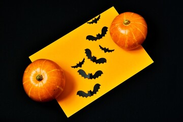 Creative card with the holiday Halloween. Happy halloween holiday concept.  Decorations, pumpkins,...