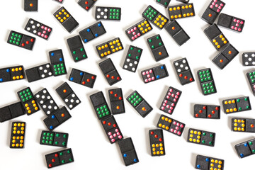 Black color dominoes with colorful on white background