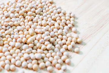 Soy bean on wooden background.
