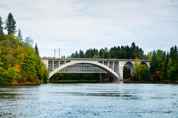 Autumn landscape of bridge and Kymijoki river waters in Finland, Kouvola, Koria