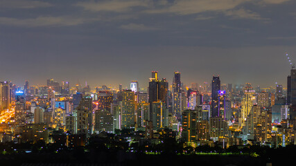 Fototapeta na wymiar Panorama of cityscape in the night at Bangkok , Thailand. Beautiful building with lighting in the evening at Thailand.