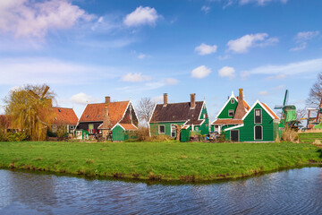 Naklejka na ściany i meble Amsterdam Netherlands, Dutch Windmill and traditional house at Zaanse Schans Village