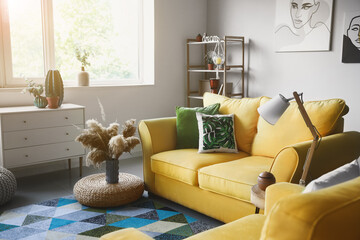 Interior of modern room with comfortable sofa