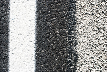 Fototapeta premium Rough road texture in full daylight. 