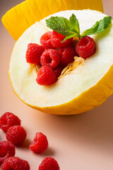 selective focus. fresh ripe fruit, melon and raspberry