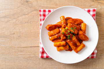 Korean rice cake stick with sausage in spicy sauce - Tteokbokki