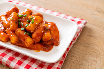 Korean rice cake stick with sausage in spicy sauce - Tteokbokki