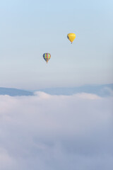 hot air balloon over the clouds
