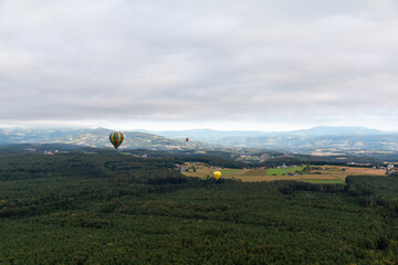 Balloon in the air over the landscape