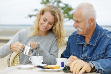 senior man with his daughte outdoors