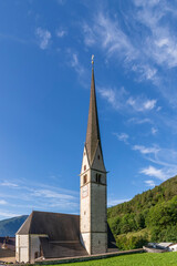 The Parish Church in the historic center of Burgusio, South Tyrol, Italy, on a sunny day