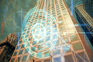 Data theme hologram drawing on city view with skyscrapers background multi exposure. Bigdata concept.