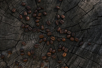 Coffee beans on wooden background