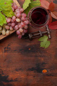 Red wine and grapes