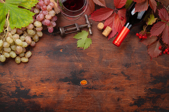 Red wine and grapes